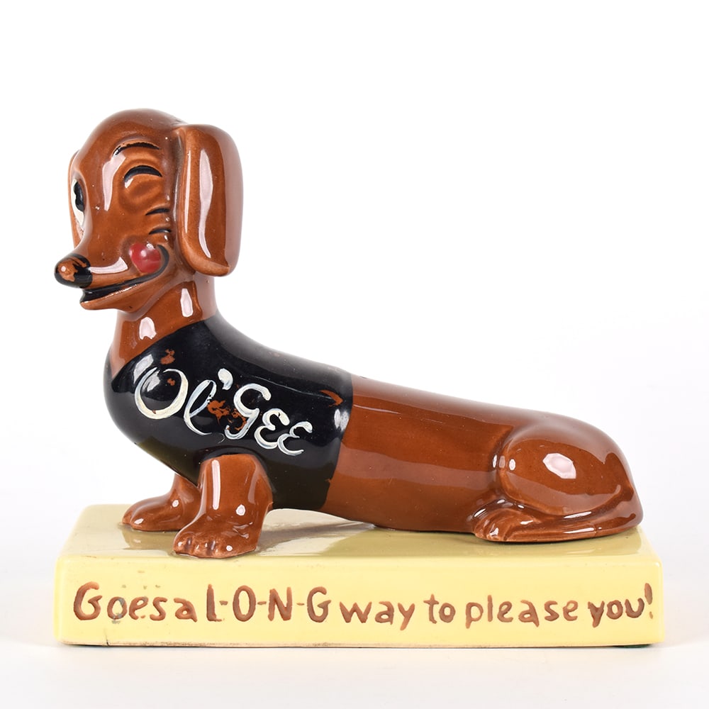Old German Beer 1950s Ceramic Back Bar Statue Ol GEE DACHSHUND: Brewer/Business Name: Queen City Brewing Co., Cumberland, Maryland Manufacturer/Plant: UnknownDate of manufacture: