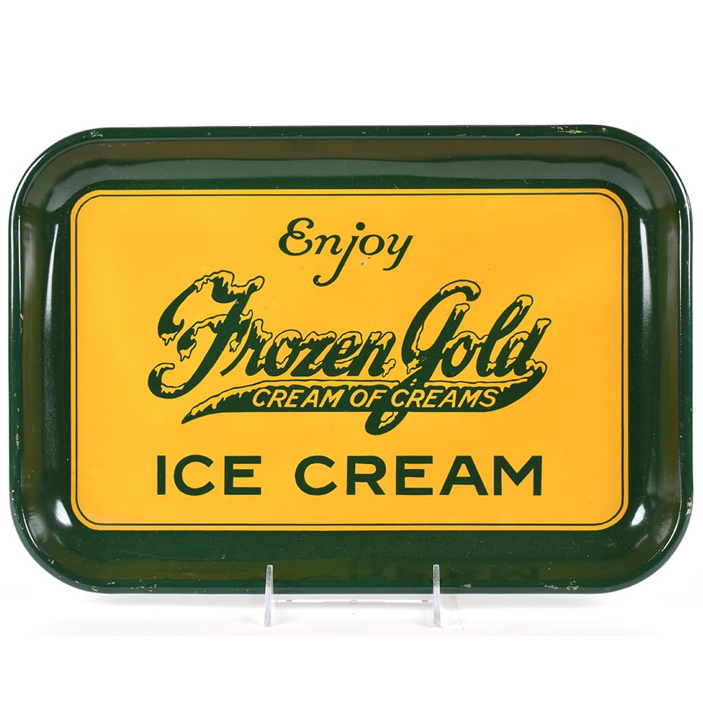 Frozen Gold Ice Cream 1930s Serving Tray: Brewer/Business Name: Frozen Gold Ice Cream, Columbus, Missouri Manufacturer/Plant: Unknown Date of manufacture: circa 1930s Contents/Type: N/A Dimensions: 15 w x 10-1/2 h. Comments/description: