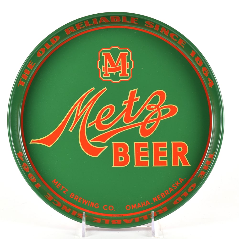 Metz Beer 1940s Serving Tray MINTY: Brewer/Business Name: Metz Brewing Co., Omaha, Nebraska Manufacturer/Plant: American Can Co. Date of manufacture: circa 1940s Contents/Type: N/A Dimensions: 12 inches. Comments/description: Superb