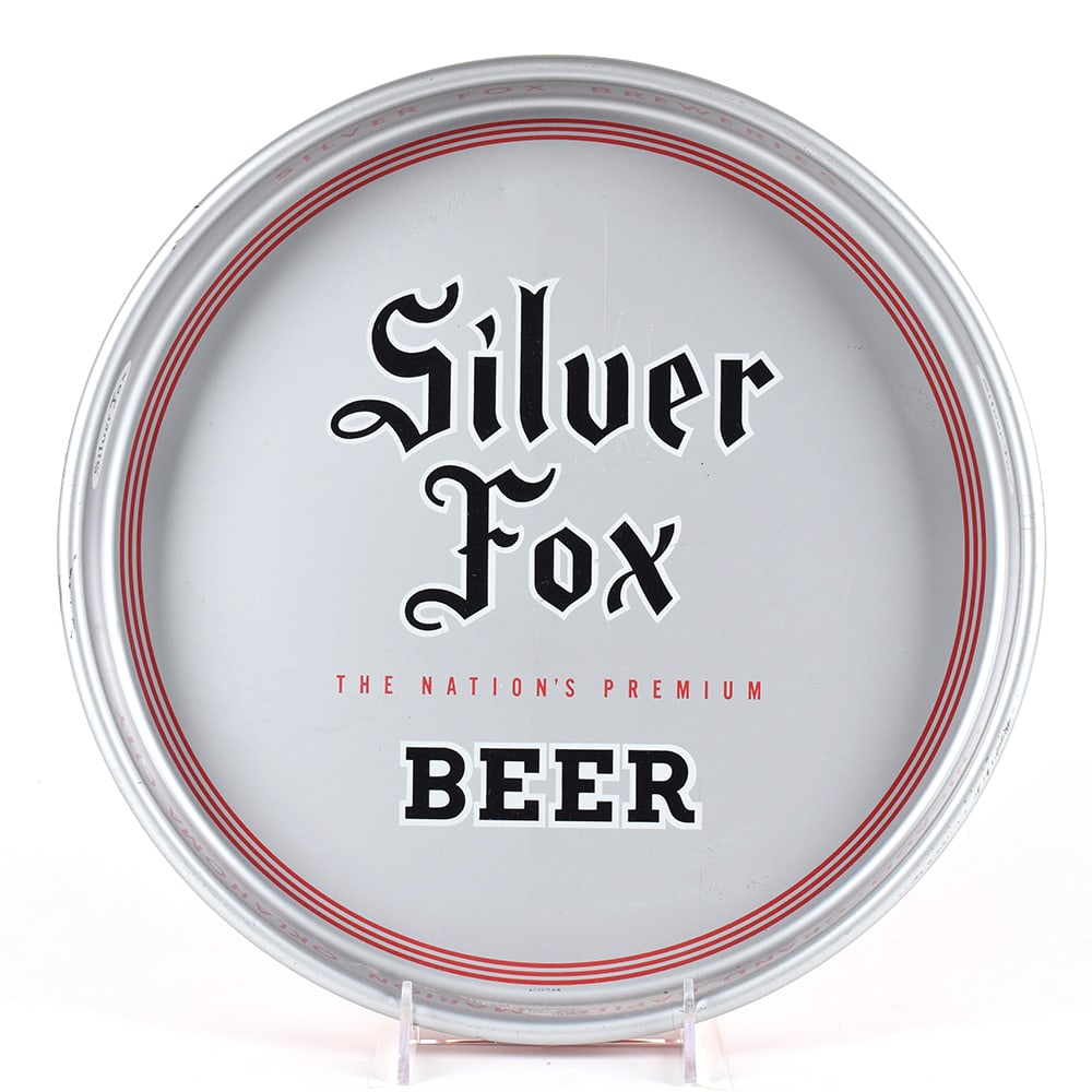 Silver Fox Beer 1940s Serving Tray: Brewer/Business Name: Silver Fox Breweries, Multiple locations, Multiple Manufacturer/Plant: American Can Co. Date of manufacture: circa 1940s Contents/Type: N/A Dimensions: 13 inches. 