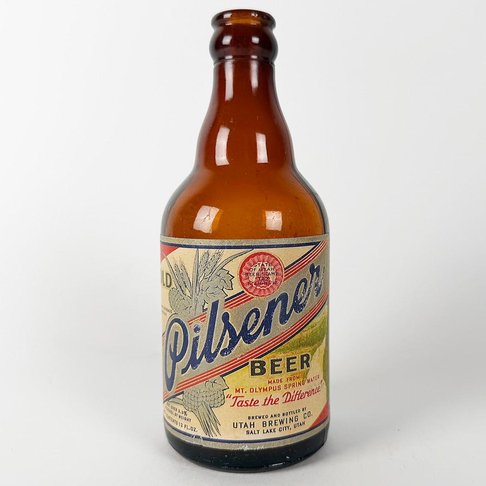 Old Pilsener Steinie Beer Bottle SALT LAKE CITY UTAH: Vintage Old Gold Pilsener beer bottle from the Utah Brewing Co., Salt Lake City, Utah. Features a brown glass bottle with the original label. A great piece of breweriana.