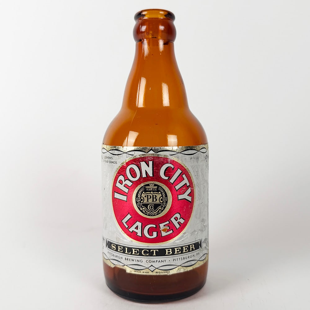 Iron City Lager Select Beer Steinie Bottle PITTSBURGH PA: Circa 1950s Iron City Lager Select Beer bottle. Features the iconic Iron City logo on a silver label with gold trim. Pittsburgh Brewing Company, Pittsburgh, Pennyslvania. 
