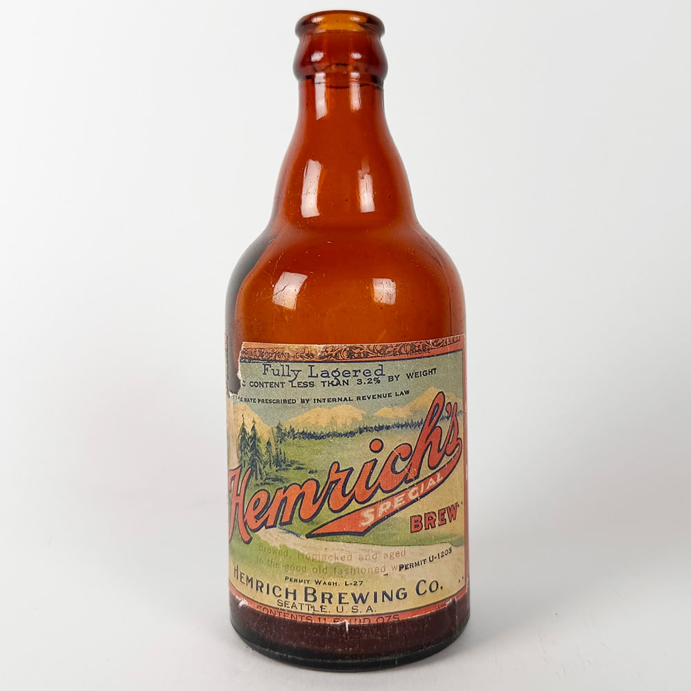 Hemrich's Special Brew Steinie Beer Bottle SEATTLE WA: Circa 1930s steinie bottle for Hemrich's Special Brew, produced by Hemrich Brewing Co. in Seattle, Washington. The label indicates the contents are 'Fully Lagered' and contain less than 3.