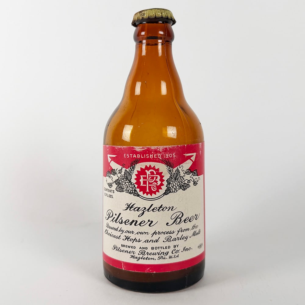 Hazleton Pilsener Beer Steinie Bottle, Pilsener Brewing PA: Circa 1950s Hazleton Pilsener Beer bottle. Brewed and bottled by Pilsener Brewing Co. Inc., Hazleton, Pennsylvania. Contents 12 fl. oz.