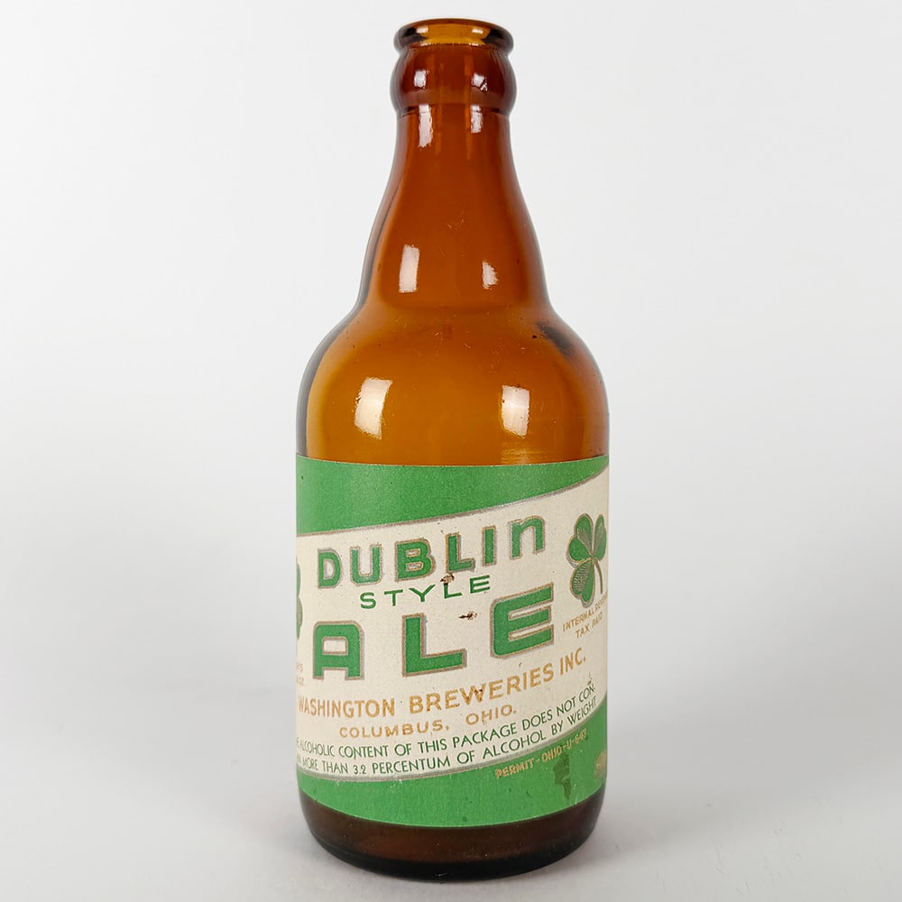 Dublin Style Ale Steinie Bottle 3 Leaf Clover Washington Breweries Columbus OH: Circa 1930s Dublin Style Ale steinie bottle from Washington Breweries Inc., Columbus, Ohio. Green and white label with shamrock or 3 leaf clover detail. "Alcoholic content of this package does no