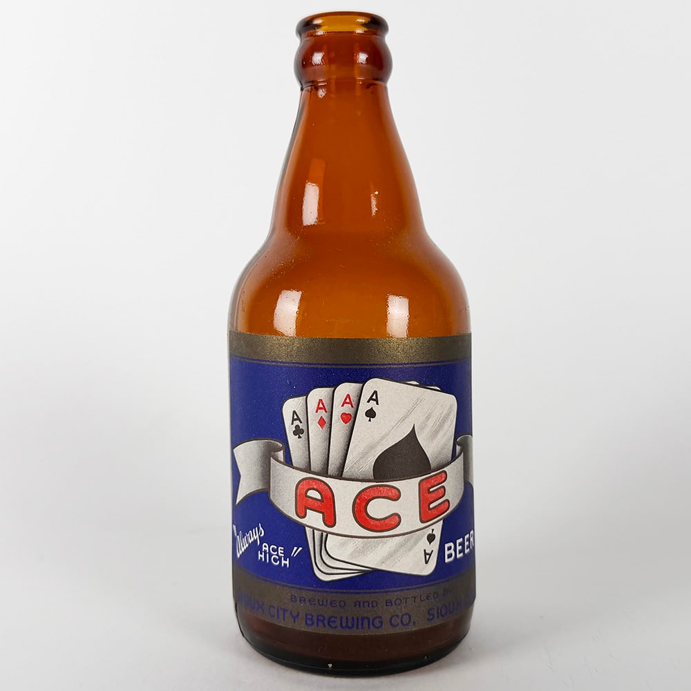 Ace Beer Steinie Bottle - Sioux City Brewing IA: Circa 1950s Ace Beer steinie bottle from Sioux City Brewing Co. of Iowa. Features a blue label with playing card design. 