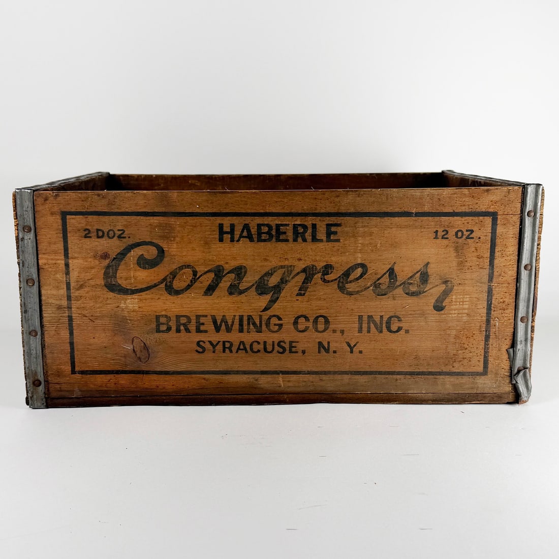 Haberle Congress Brewing Wooden Crate: Circa 1930s wooden crate from Haberle Congress Brewing Co., Inc. of Syracuse, N.Y. Features black lettering and metal reinforced corners. 19 x 12 x 8 inches.