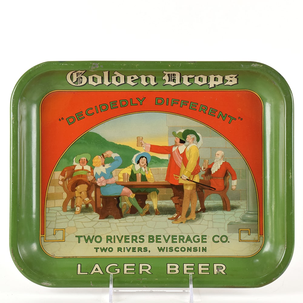 Golden Drops Lager Beer 1930s Serving Tray CAVALIERS: Brewer/Business Name: Two Rivers Beverage Co., Two Rivers, Wisconsin Manufacturer/Plant: American Can Co. Date of manufacture: circa 1930s Contents/Type: N/A Dimensions: 13 w x 10-1/2 h.