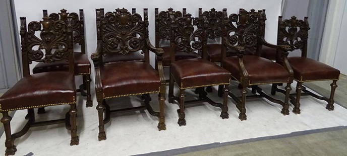 Set of 10 Oak Horner Chairs: Spectacular set of 10 Horner oak chairs with carved backs, lion posts, 8 sides, 2 arms all done in a brown leather