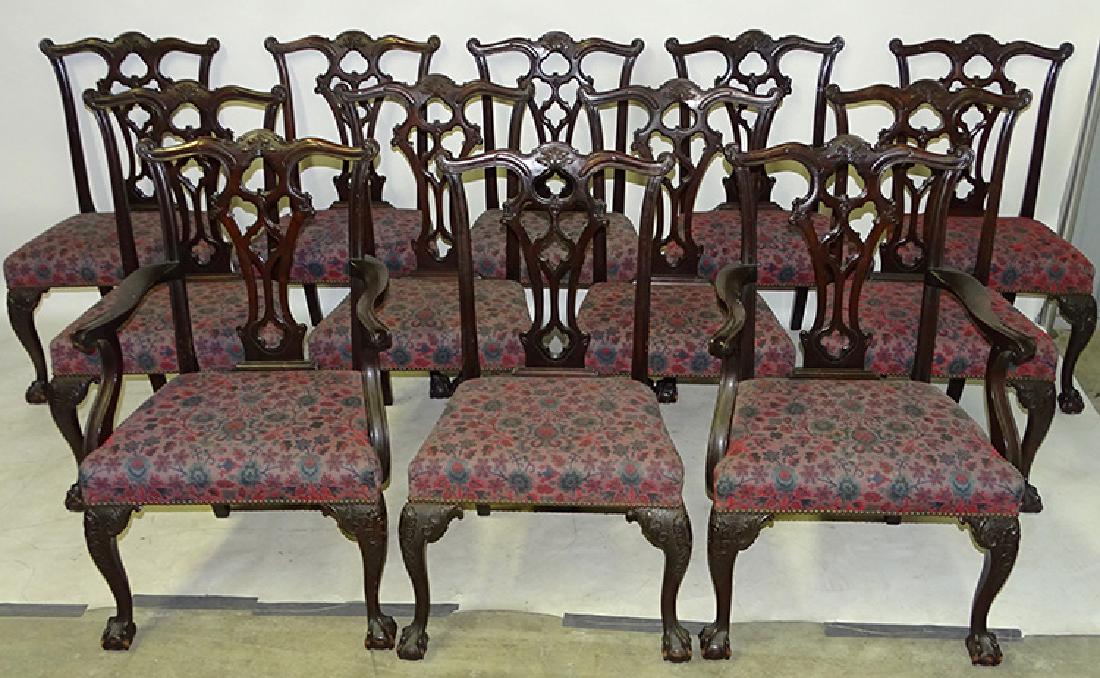 Set of 12 Centennial Chippendale Chairs: Set of 12 centennial Chippendale chairs with large claw and ball feet and fancy backs, includes 2 arm chairs. C. 1890-1910
