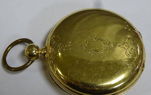 Large 18k Gold National Pocket Watch: Early 18k pocket watch marked National Watch Co. on front. Elgin, Illinois. Serial #3828. Runs then stops. Case engraved with a star. Total weight 131.4 grams. 3 1/8" top to bottom.