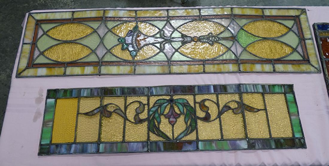 3 Nice Leaded Windows: 3 nice multicolored leaded windows. Not framed. A couple of small checks. 1 is 53" wide, 14" tall. 1 is 42" wide, 11" tall. 1 is 25" wide, 20" tall (arched).
