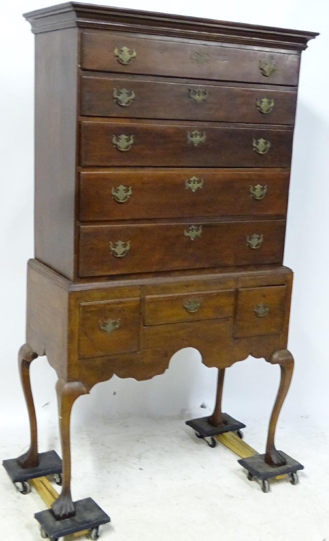 Cherry Flat Top Highboy: Nice cherry 2 piece highboy with cut out bottom skirt, carved feet with wide board back. 70" tall, 38" wide, 18" deep.