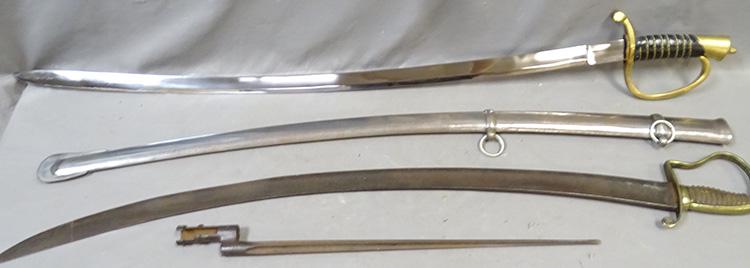 2 Swords & Bayonet: 2 swords. (1) early sword with brass hand guard and (1) replica sword with scabbard. (1) antique bayonet.