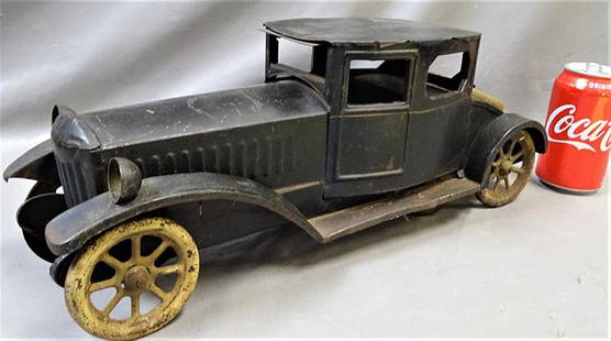 Early 1920's Press Steel Friction Car: 1920's press steel friction car by Dayton Schieble Toy & Novelty Co. Dayton, Ohio. In original paint. 17" long.