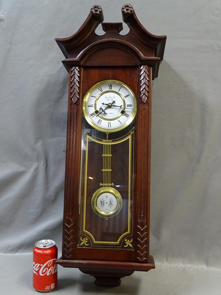 Model 715M Elgin Wall Clock: Model 715M Elgin wall clock in mahogany. "The Viennese". Not antique, springs all good.