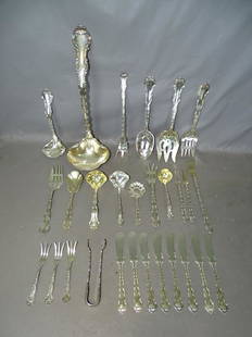 28 pc Sterling silver Set: (28) piece sterling silver set. Mostly fancy sterling pieces. (2) pieces monogramed. 36.7 troy oz.