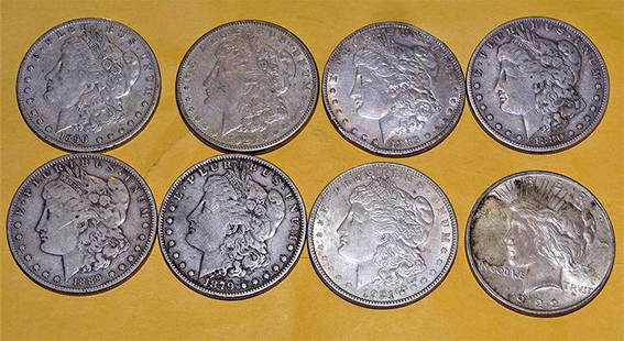 8 Estate Silver Dollars: (8) estate silver dollars. (7) Morgan, (1) Peace.