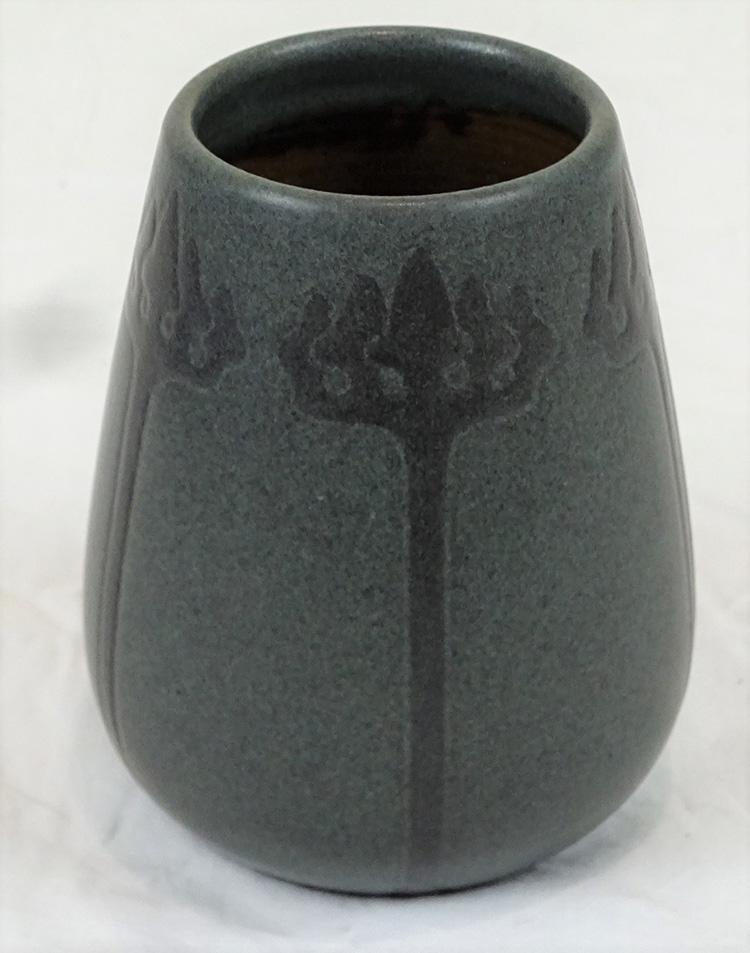 4 1/2" Artist Signed Incised Marblehead Pottery: 4 1/2" Marblehead pottery vase, incised design in perfect condition. Artist signed H. T. (Arthur Hennessey) Decorated by Sarah Tutt. 4 1/2" tall, 3 1/2" wide.