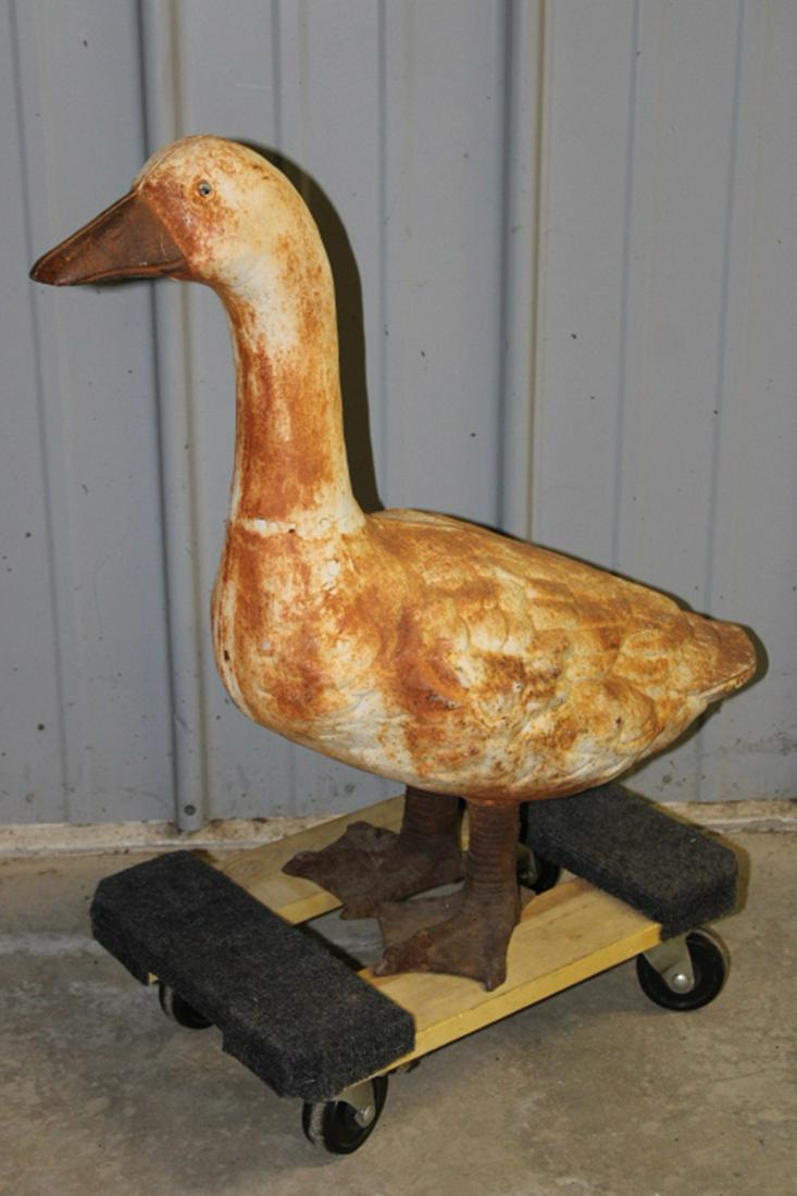 Large Cast Iron Goose: Large cast iron goose. No cracks or breaks. 10" wide, 26" tall, 24" deep.