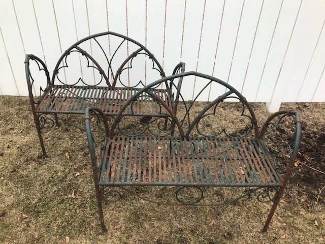 Pair of Antique Wrought Iron Gothic Benches: Pair of antique wrought iron gothic benches in old green paint from oldest house in Columbia County. 43" wide, 35" tall, 11" seat.