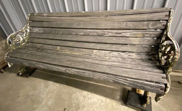 Iron Side Bench By Robert Woods: Iron side bench by Robert Woods. Loose and needs tightening. 72" wide, 33" tall, 29" deep.