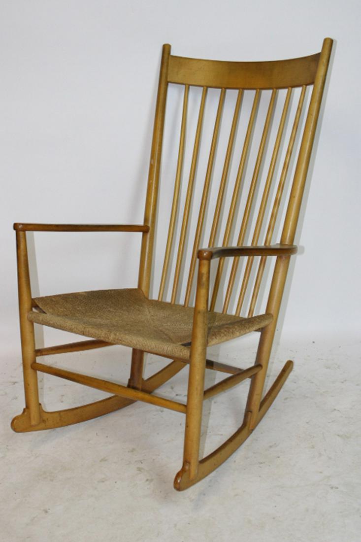 Mid-Century Mobler Rocker: Mid-century mobler rocker stamped and tagged with original seat and finish. 23" wide, 40" tall, 26" deep.