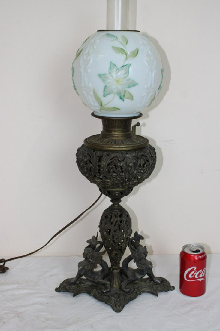 Super Piano Lamp with Winged Lady Base: Super piano lamp with winged lady base, cupid head, and blown out shade. 12" wide, 28" tall, 7" deep.