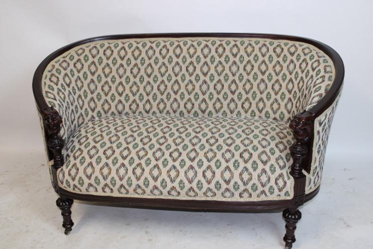 Nice Victorian Loveseat with Lions: Nice Victorian loveseat with lions and wrap around back. Newly reupholstered. 53" wide, 31" tall, 29" deep.