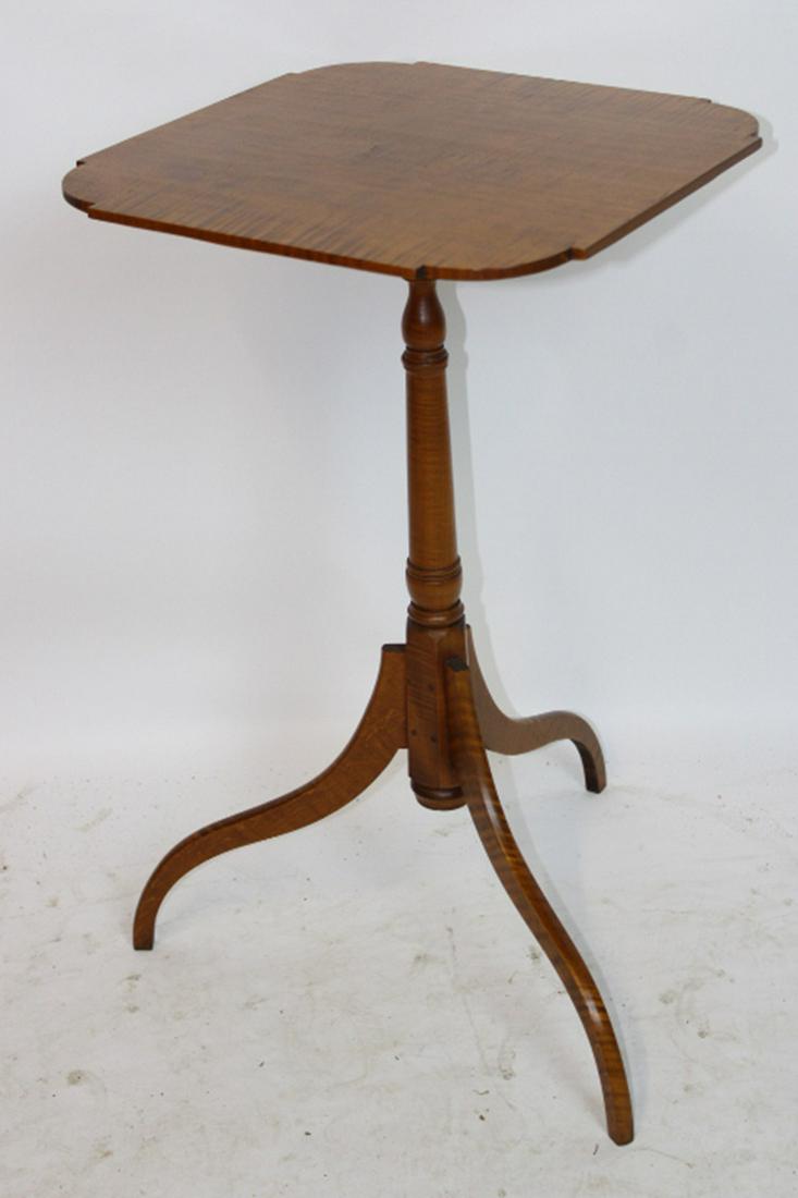 Signed Eldred Wheeler Tiger Maple Candle Stand: Signed Eldred Wheeler tiger maple candle stand with finely turned pedestal and cookie corners. 16" wide, 28" tall.