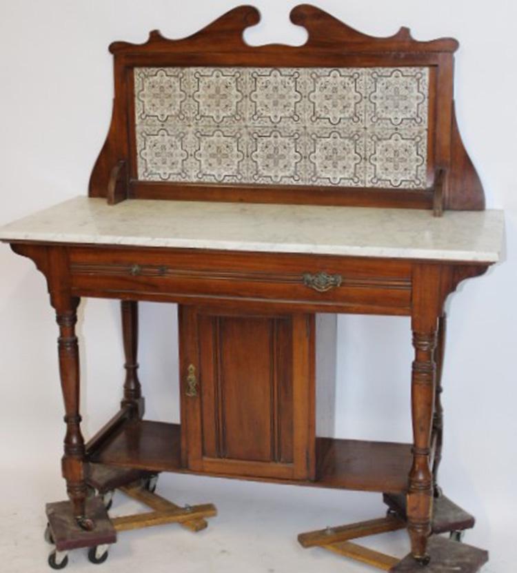 Victorian Tile Back Wash Stand: Victorian tile back wash stand with marble top. Missing 1 pull. 45" wide, 48" tall, 20" deep.