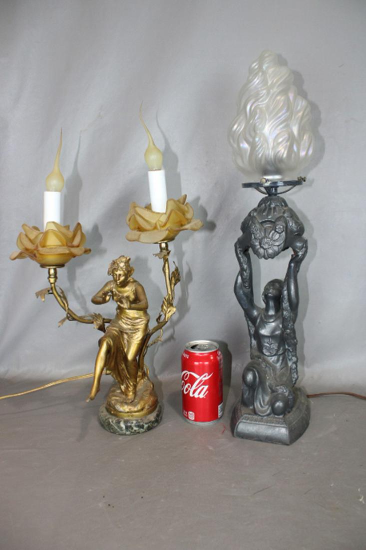 2 Nice Antique Figural Lamps: 2 nice antique figural lamps (1) with lady sitting on a tree. Signed A. Gader with a French foundry (chip on a leaf). Spelter lamp with flame shade (small chip off metal in back). 22".