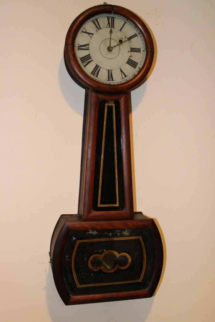 Early Weight Driven Banjo Clock by Geo Taylor: Early weight driven banjo clock by Geo Taylor Providence, RI. Flaking on the bottom glass. 11" wide, 28" tall, 4" deep.