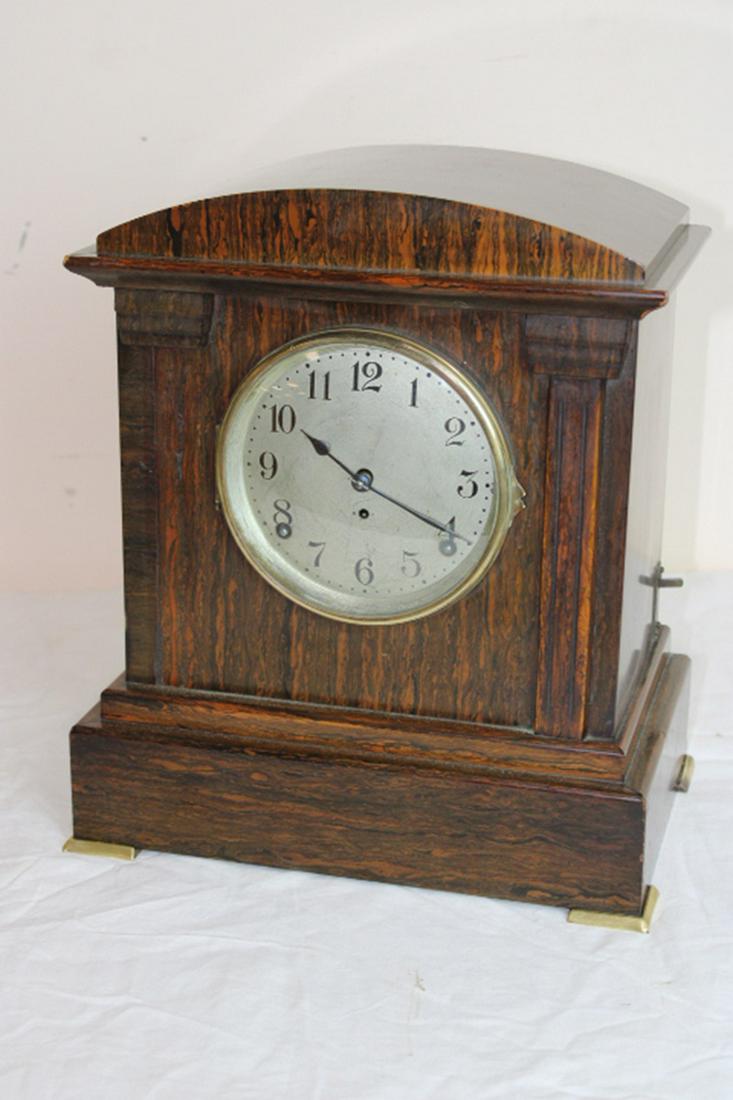 Nice Sonora Chime Clock: Nice Seth Thomas Sonora chime clock with great rosewood case. Springs are good. Missing a piece on the left column. I do not know if it works. 11" wide, 14" tall, 7" deep.