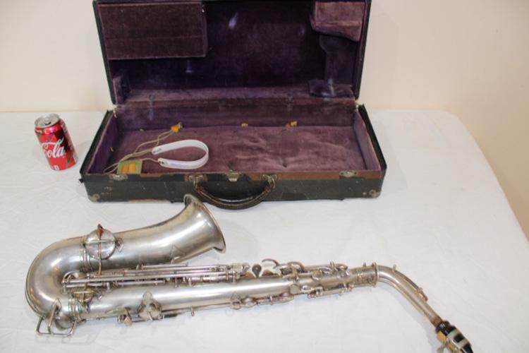 Pan American Saxophone: Pan American saxophone with case. 27" long.