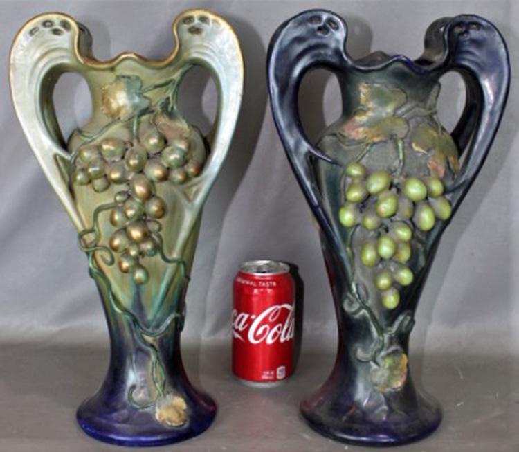 Pair of 15" Amphora Vases: 2 Amphora vases with large cluster of grapes (one on the right has a small piece of leaf - see photo). In cobalt. 8" wide, 15" tall, 5" deep.