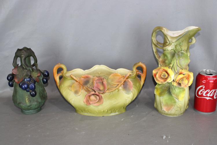 3 Pieces of Amphora Style Porcelain: 3 pieces of Amphora style porcelain with roses and grapes. Tall pitcher has a line and chip on leaf.