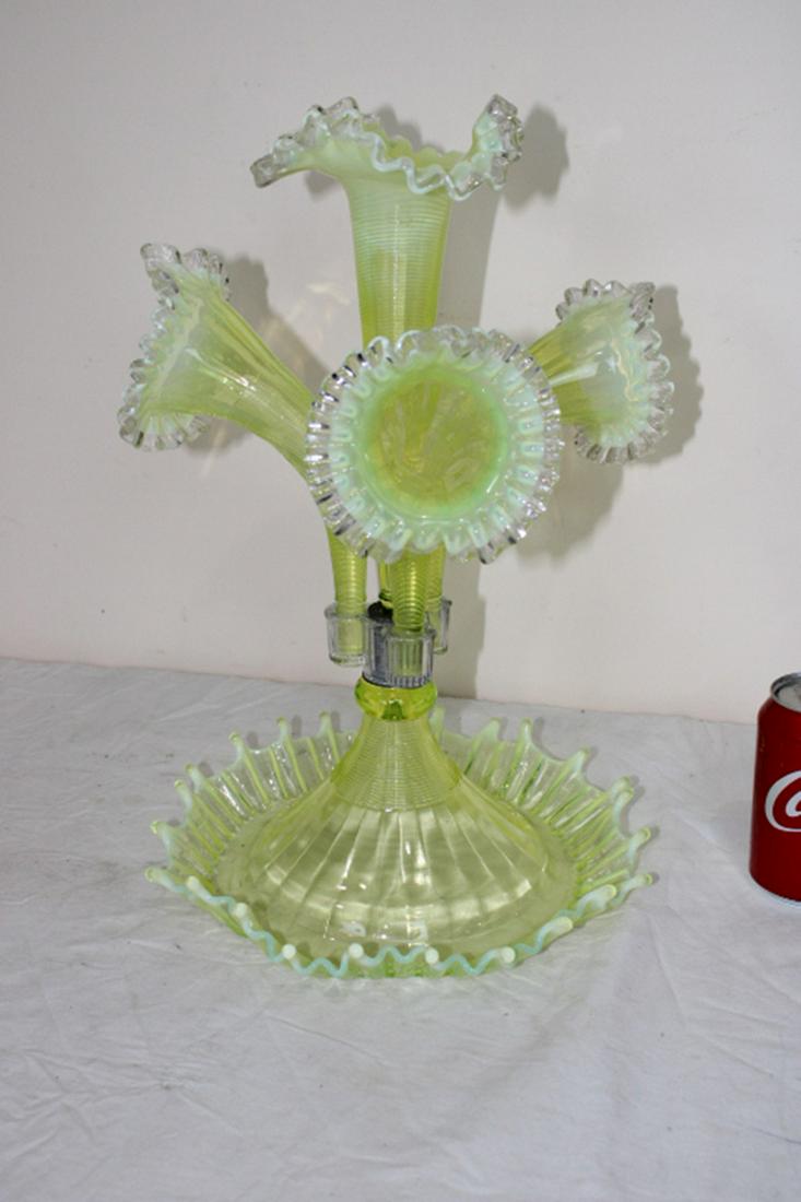 Vaseline Opalescent Epergne: Vaseline opalescent epergne. All Vaseline is good. Sliver chip on the clear holder (see photo). 11" wide, 17" tall.