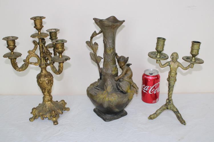 Group of Fancy Metal Ware: Group of fancy metal ware including nouveau vase with cupid, brass candlestick with figure and bird claw, and 3 arch candelabra.