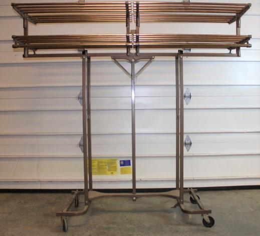 Wonderful Mid Century Folding Coat Rack: Wonderful mid century fold up coat rack by Vogel-Peterson Co. Illinois. Folded out 6'4". 76" wide, 72" tall, 24" deep.
