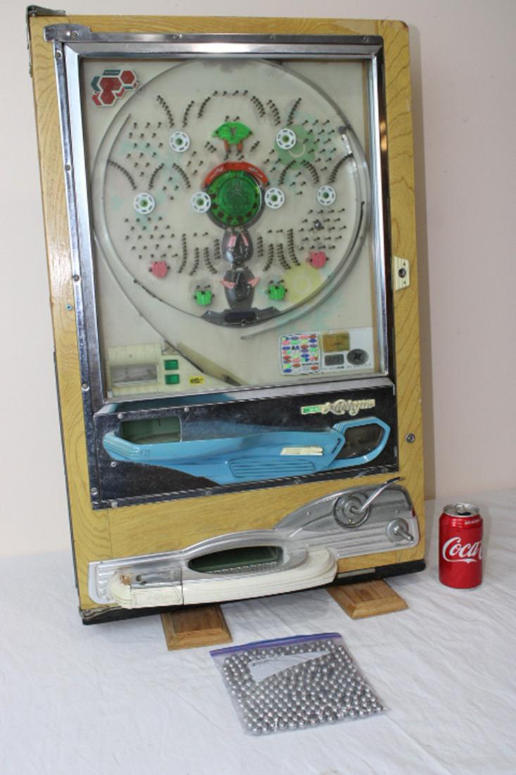 Real Clean Pachinko Machine: Real clean Pachinko machine in nice condition. Working. 21" wide, 33" tall, 10" deep.