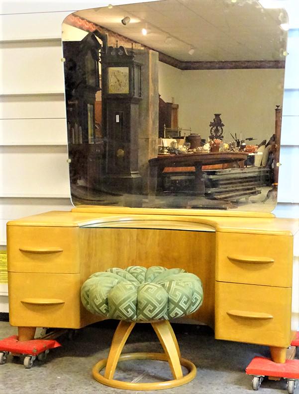 Signed Heywood Wakefield Vanity and Stool: Signed Heywood Wakefield vanity with flower shaped stool. 49" wide, 59" tall, 18" deep.