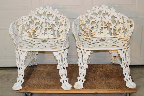 Pair of Cast Iron Grapevine Patio Chairs: Pair of cast iron grapevine patio chairs with grapes. All in nice condition. 22" wide, 27" tall, 19" deep.