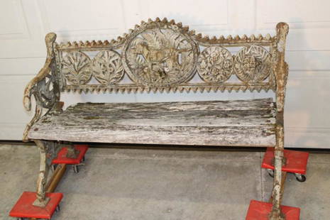 Cast Iron Bench with Pointer and Birds: Cast iron bench with pointer and birds on back, bird arms with floral medallions. No cracks or breaks, set missing a piece of wood (see photo). Pittsfield estate. 50" wide, 32" tall, 20" deep.