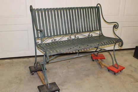 Nice Vintage Iron Bench: Nice vintage iron bench with scrolled arms and legs, iron strapped seat and back. 45" wide, 36" tall, 24" deep.