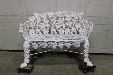 Antique Cast Iron Grapevine Bench: Antique cast iron grapevine bench, very fancy. Back legs have been repaired (see photo). 44" wide, 33" tall, 16" deep.