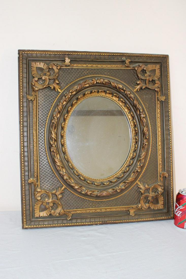 Super Antique Mirror with Original Gold: Super antique mirror with original brass and gold finish. Deep fancy trim. 20" wide, 22" tall.