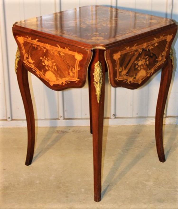 Pristine Victorian Inlaid Drop Leaf Lamp Table: Pristine Victorian inlaid lamp table with 4 drop leaves with floral rosewood and satinwood inlay with bronze ormolu in excellent condition C. 1870-1880s. 23" wide, 30" tall, 23" deep.