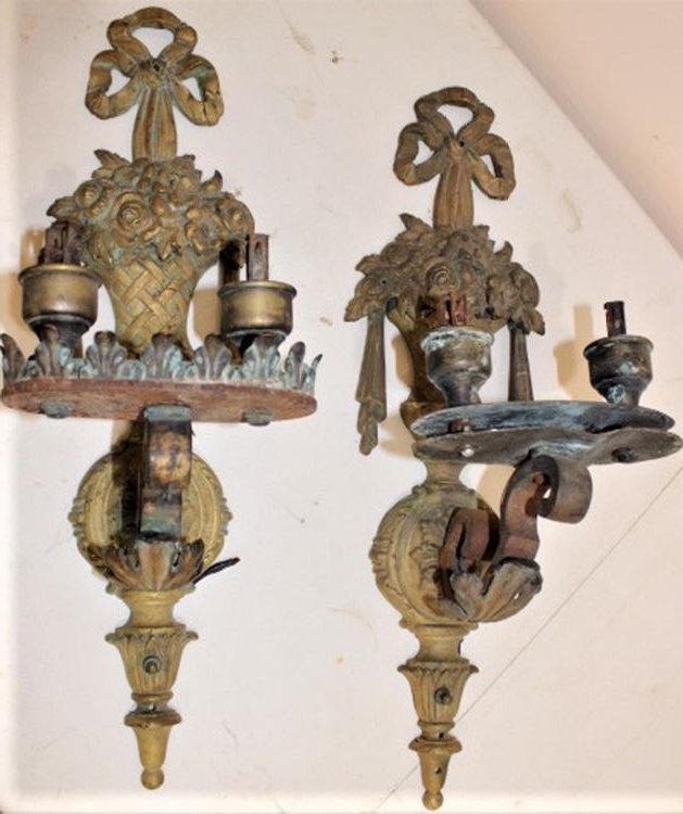 Pair of Antique 24" Bronze Sconces: Pair of antique 24" bronze sconces, heavy with basket of flower design. Needs cleaning, missing filigree near candle holders. 7" wide, 24" tall.