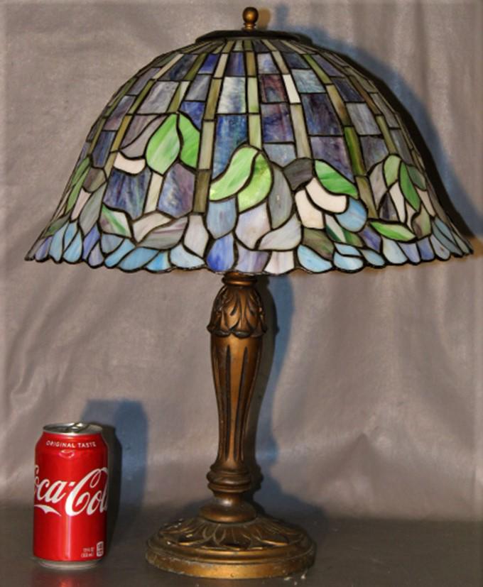 Multi Colored Leaded Table Lamp: Multi colored leaded table lamp. Shade is not as old as the base. 16" wide, 20" tall.